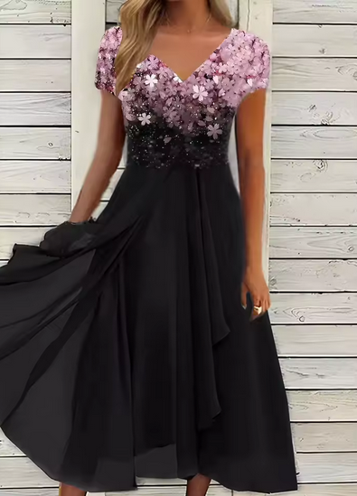Hochtailliertes Sommerkleid mit Blumenstickerei