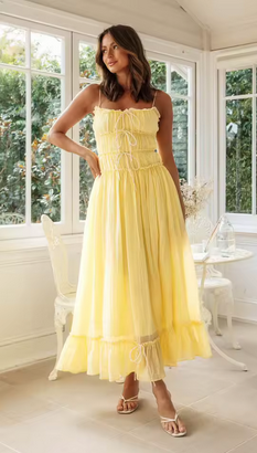 Sommerkleid mit Rüschen und schönen Schleifen